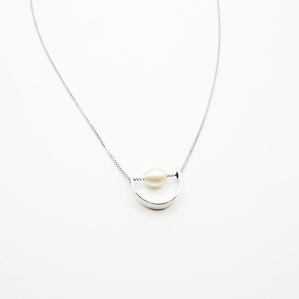 Modern Pearl Arc Necklace