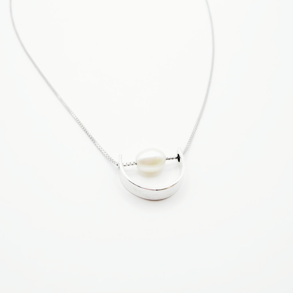 Modern Pearl Arc Necklace